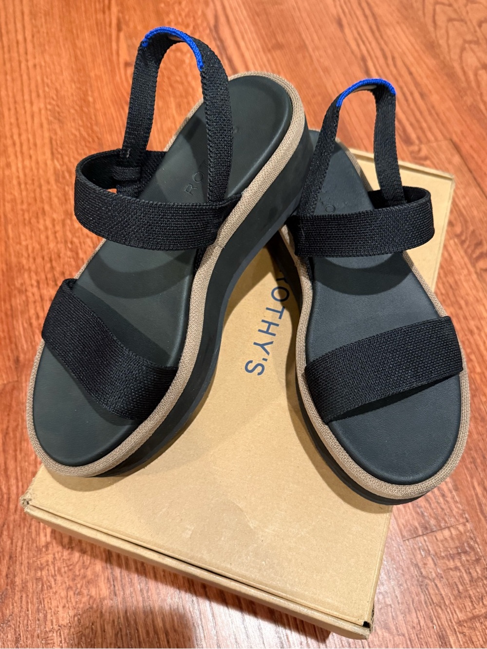 Rothy's women’s Black Strapped Sandals with Brown Trim size 7.